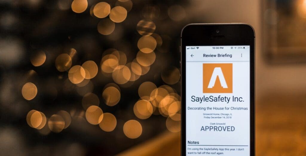 safety app open next to christmas decorations
