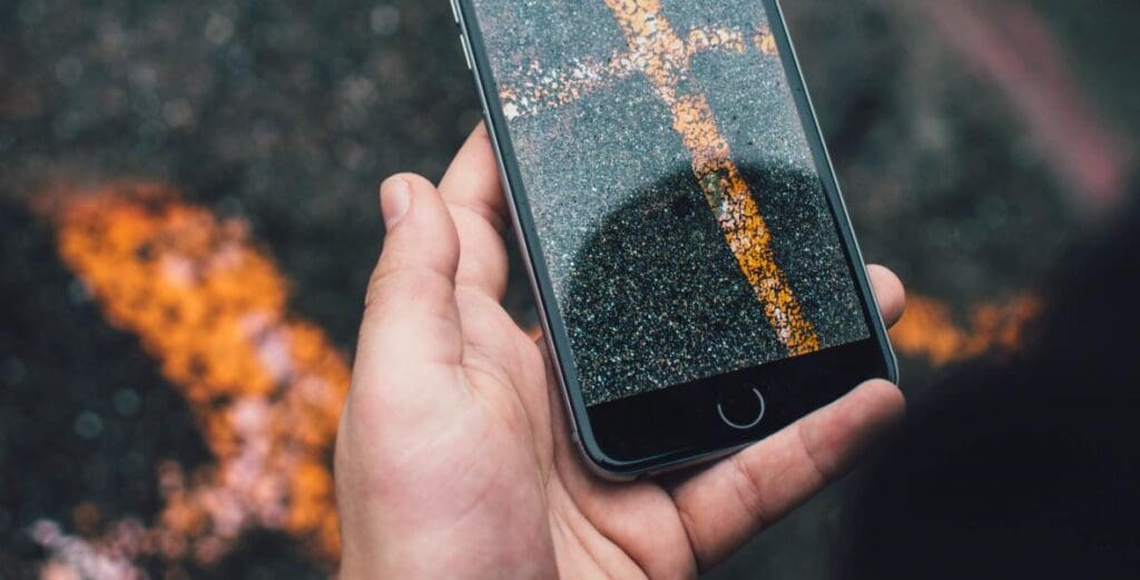 person holding iphone